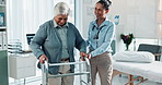 Woman, doctor and patient with walker for elderly care, physiotherapy or slow recovery in rehabilitation at hospital. Female person, physiotherapist and senior with stroller for walking aid at clinic