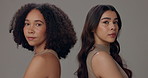 Women, beauty and together with face in studio, confident or back for hairstyle by background. People, girl and model with afro, hair care or cosmetic for beauty, change or transformation in Colombia