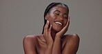 Black woman, face and smile for skincare, treatment or cosmetics on gray studio background. Happy African model, glow and satisfied with beauty, moisturizing and natural skin health for wellness