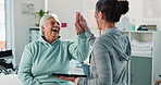 Healthcare, elderly woman and physio with high five, tablet and happy success in medical office. Laughing, physiotherapist and old person with digital app for results, online progress and senior care