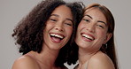 Women, closeup and laugh in studio for beauty, solidarity and bonding together with hug, happy or face. Friends, diversity and inclusion on white background for natural, empowerment and confidence