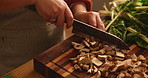 Cooking, mushroom and breakfast with woman in kitchen for health, vegetables and food. Wellness, nutrition and diet with person cutting ingredients in home for homemade meal,  detox or organic brunch