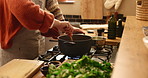 Pot, cooking and hands of couple in kitchen together with teamwork on food recipe, lunch and bonding in home. Diet, wellness and man helping woman in apartment with partnership, meal prep and love