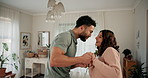 Love, romance and dance with couple in bedroom for music, happiness and celebration. Smile, support and marriage with man and woman listening to audio at home for date, partnership and care together