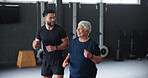 Personal trainer, man and senior woman in gym with cardio, warm up and happy for fitness in retirement. Coach, mentor and elderly person with smile, advice and jogging for start to workout for health