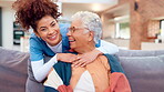 Nurse, elderly woman and hug with caregiver in nursing home for consultation, wellness and empathy in retirement. Woman, senior care and embrace with helping hand, assistance and healing for comfort