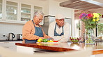 Smile, cooking and senior couple in kitchen together with healthy food, relationship and happy in retirement. Diet, old man and woman in home with bonding, support and love with meal prep for lunch