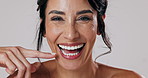 Face, woman or pointing to mouth for dental health, smile or confidence on white studio background. Portrait, person or model with grooming routine, oral hygiene and laughing with teeth whitening