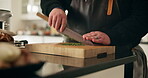 Cutting board, chopping and hands in kitchen, vegetables and meal preparing for event, cooking and restaurant. Recipe, chef and person with ingredient for culinary, table or wellness of food in hotel