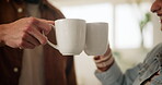 Morning, tea and couple toast in home kitchen with conversation, cup and mug with drink. Relax, communication and love of people with cheers, house and marriage talking for breakfast plan with coffee