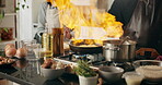 People, flambe and kitchen as chef for nutrition, diet or hospitality in home with frying pan. Fine dining, culinary art and gourmet cuisine with cooking technique for meal preparation, skill or food