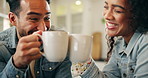 Couple, happy and drinking coffee with cheers in home for celebration, laughing and funny conversation in kitchen. People, toast mug and bonding with beverage in house for support and congratulations