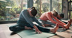 Yoga, stretching and people on mat in class for fitness, natural exercise and morning balance together. Workout, pilates and group on floor for muscle warm up, body wellness and self care in studio