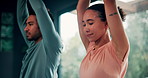 Stretching, man and woman in class for yoga fitness, natural exercise and healthy morning balance together. Workout, pilates and couple in gym for muscle warm up, body wellness or self care in studio