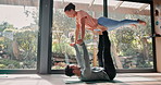 Fitness, yoga and couple for balance in home for exercise, training and workout in living room. Dating, pilates and man and woman on sports mat in air for wellness, health and cardio for endurance