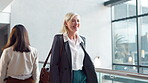 Office, mature woman and walking with smile for career, positive and corporate ceo with confidence. Morning, female manager and happiness with hello for greeting, friendly and ambitious in workplace