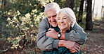 Hugging, happy and senior couple in nature with love, care and marriage commitment on holiday. Romantic, adventure and elderly man and woman embracing for bonding outdoor on vacation or weekend trip.