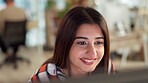 Computer, design and smile with creative woman at desk in workplace for professional web development. Business, desktop and reading with confident graphic designer in agency office for research