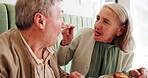 Elderly couple, eating and breakfast in restaurant for relax, relationship and morning with feeding partner. People, hungry and food in cafe for marriage, brunch or bonding with  nutrition on date