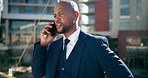 African business man, phone call and talk in city for negotiation, contact and stress for legal career. Lawyer, attorney or advocate with smartphone, conversation and thinking on bridge in Kenya