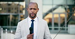 Man, news reporter and talking with microphone in city, face and investigation for story in street. African journalist, tv presenter and broadcast at real estate for tax fraud headline in Kenya