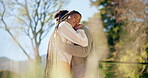 Happy, love and bonding with black couple and hug in backyard for romance, date and relationship. Marriage, embrace and anniversary with African man and woman dancing for relax, peace and calm