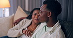 Home, relax and black couple with popcorn, entertainment and watching tv in living room. African man, woman or weekend break with comfort, film or hobby with movie, eating or series with relationship