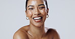 Glow, face or woman laughing with makeup or smile in studio on white background for shine or health. Portrait, dermatology or happy female model with confidence, cosmetics or beauty skincare results