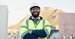 Happy man, architect and helmet with confidence in city for construction, building or architecture on rooftop. Portrait, male person or civil engineer with smile or hard hat for safety in England