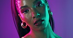 Neon lights, cosmetics and face of woman in studio with beauty, creativity and vibrant color. Makeup, jewelry and portrait of female model from Cuba with art self expression by purple background.