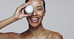 Cream, portrait or woman laughing with skincare or smile in studio on white background for glow or shine. Natural facial lotion, confident or happy model with sunscreen, beauty or cosmetics results