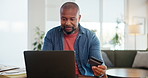 Smile, laptop and credit card with living room, online shopping and ecommerce. Black man, computer and payment for review or sales and website for retail, technology and customer on living room sofa