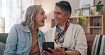 Cellphone, funny and mature lgbtq couple laugh together in home browsing social media or app. Gay, love and comedy with happy lesbian women looking at memes on smartphone for fun or romantic bonding