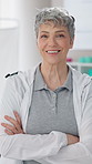 Happy, physiotherapy and face of woman with crossed arms for help, medical support or physical therapy. Healthcare, professional and portrait of chiropractor for rehabilitation, recovery and wellness