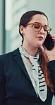 Woman, flight attendant and walking with discussion in phone call at airport for communication and networking. Female person, employee and smile or happy as air hostess with luggage for traveling