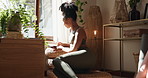 Woman, smile and notebook by window for yoga journey, daily reflection and experience after session. Home, female person or yogi with journal for fitness, tracking progress and notes for mindfulness