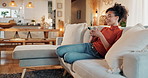 Sofa, happy woman and notification with smartphone for chat, text message and communication with contact. Home, female person and cellphone with mobile app for scroll, share reel and relax on couch