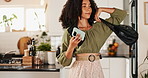 Woman, reading and shopping list in kitchen, home and leave with handbag, phone and thinking with paper. Person, smartphone and notes with purse, packing and ready to start morning in apartment