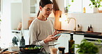 Woman, scroll and cooking with phone in kitchen for text message, search online recipe and meal ingredients. Person, thinking and smartphone for food tutorial, social media ideas or blog tips in home