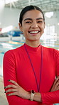 Face, woman and coach for swimming sport of fitness class, aquatic learning and water exercise at pool. Female teacher, arms crossed and swimmer safety with wellness performance for start of lesson