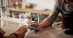 Hands, barman and pos with credit card, payment and discount with sale, iot and fintech at restaurant. People, bartender and customer experience with machine, services and help with financial freedom