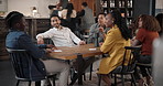 Happy friends, talking and people at pub for party, reunion or new year celebration at event. Group diversity, conversation and social gathering at restaurant for relax, meeting and communication