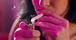 Hands, cigarette and lighter for smoking in nightclub for addiction, party and bad habit at event. Person, smoker and spark with fire, flame and nicotine in mouth, tobacco and dark at social lounge