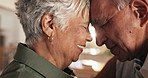 Senior, couple and bonding with love in home for romance, loyalty and commitment in marriage with smile. Elderly, people and affection with intimacy, trust or support in retirement in lounge of house