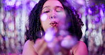 Face, glitter and woman with celebration, blowing and excited with winner, party or cheerful in club. Portrait, happy person or girl with glamour, elegant and energy with event, smile or surprise