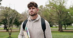 Student, walking and books for education, man and confident of goals, park and learning for diploma. Nature, campus and person with scholarship, studying and knowledge of guy and thinking for college