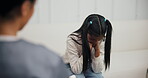 Girl, crying and doctor in hospital for consulting, healthcare and medical assessment with conversation. Trauma patient, depression and pediatrician in clinic for evaluation, adhd and mental health