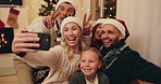 Christmas, big family and selfie on sofa, living room and bonding in home. Peace sign, smile and parents with girl for party, celebration and holiday with love and hug on lounge couch with santa hat