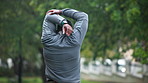 Stretching, fitness and back of black man in park for exercise, marathon training and running. Sports, athlete and person outdoors for warm up, workout and start for wellness, health and performance