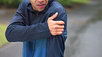 Man, stress and fitness with shoulder pain in nature for sports injury, exercise and muscle tension. Athlete, accident and runner with problem at park for training bruise, workout and sprain in joint
